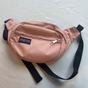 Pink Jansport crossbody pack